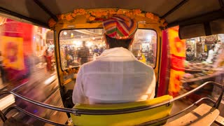 autorickshaw-pov-busy-illuminated-old-city-streets-udaipur-rajasthan-india-4k-timelapse_ssr0atyf__s0011
